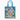 Tote bag with a colorful design of books, animals, and plants on a blue background