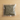 Small transparent plastic bag with dried herbs on a dark textured surface