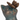 A close-up of a decorative cat figurine with a metallic bronze finish and green patina, featuring a butterfly perched on its head against a plain white background.