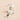 Close-up of white cat ring holder.