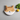 Ceramic plate shaped like a cat's face on a white background
