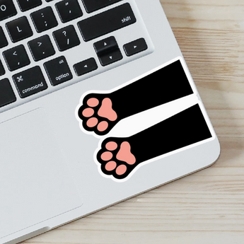 Black Cat Toe Bean Sticker on a laptop