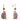 Purple and gold cat-shaped earrings with red beads on a white background
