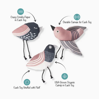Three bird-shaped catnip toys in black, white, and pink colors, perfect for feline fun.