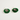 A pair of gold-tone fishhook earrings with round green tinsel wreath charms, each featuring a small gold-toned Santa Claus figure inside.