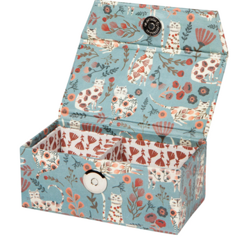 In Bloom Jewelry Box with white cat and floral motif on light blue background, perfect for storing necklaces and rings.