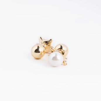 Double Sided Cat Pearl Earrings, highlighting their playful design.