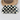 White and black checkered cat hair comb, mini pocket-sized comb for on-the-go use.