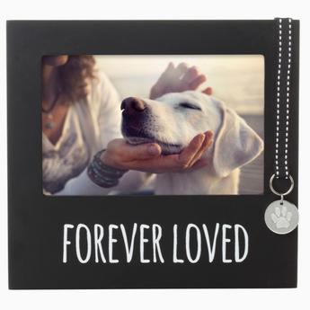 Pet memorial frame featuring a 4” x 6” photo and decorative ribbon 