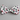 Woodlands Bow Tie in white featuring Christmas trees in red, green, and black plaid.