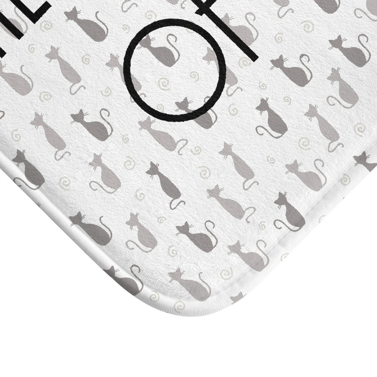 Cat themed home decor for cat lovers - a floor mat with cat print and the text "There's like a bunch of cats in here".