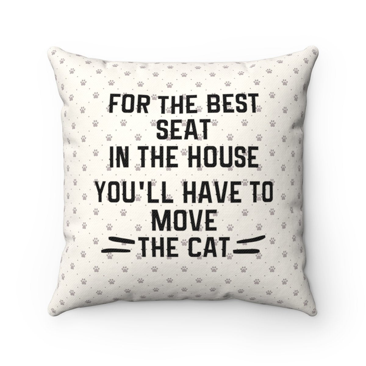 Refresh your cat home accessories collection with this funny cat pillow featuring the text "For the best seat in the house you'll have to move the cat" on a beige paw print background.