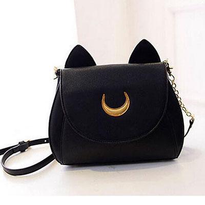 This black cat purse is shaped as a cat with pointy cat ears.