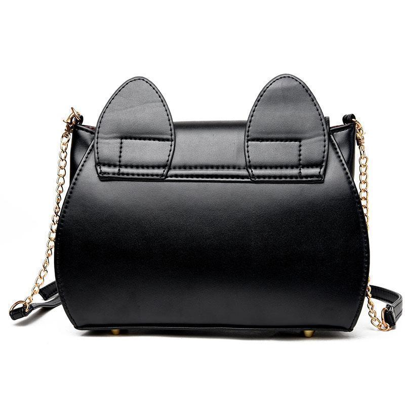 Made from black faux leather, this cat crossbody purse is shaped like a black kitty cat.