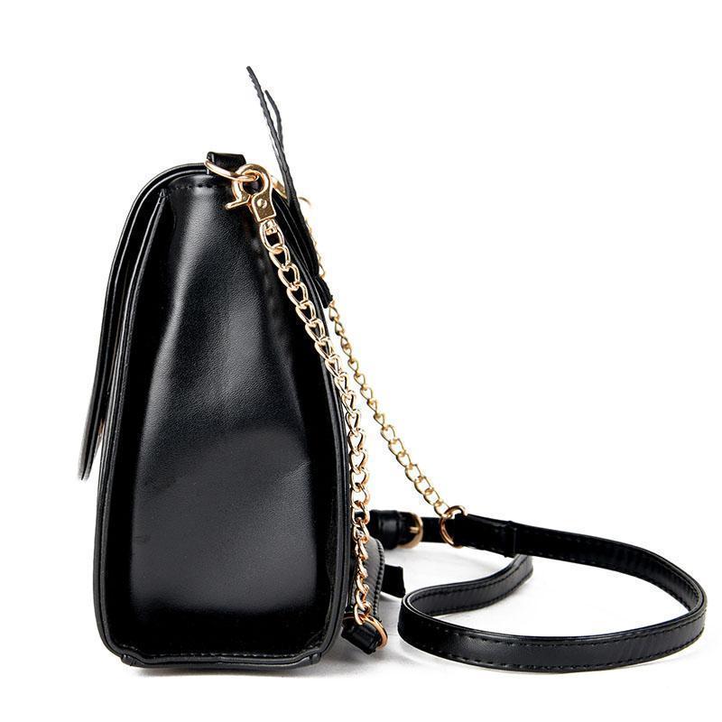 The crossbody strap of this Black Cat bag can be adjusted for extra comfort.