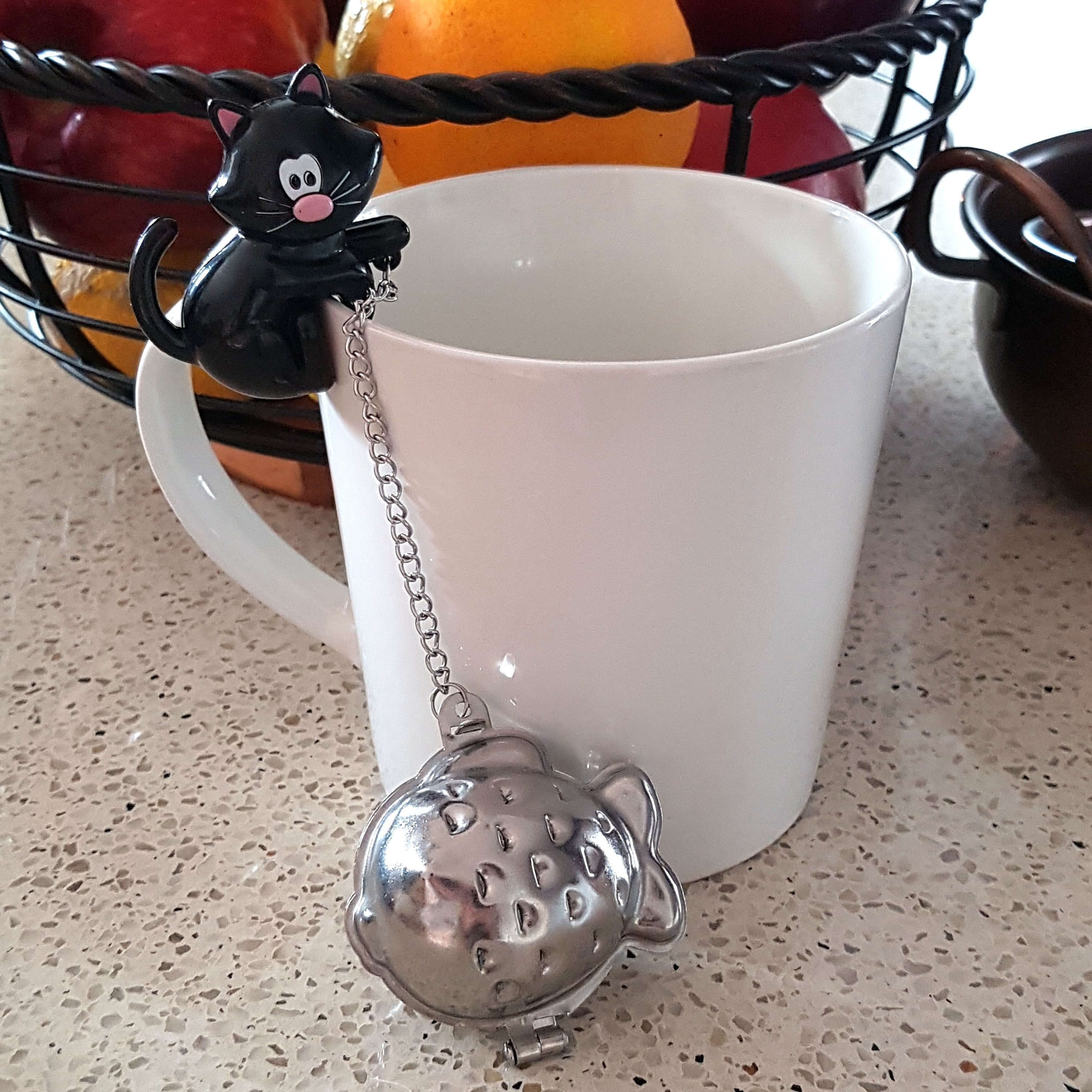Cat Tea Strainer with a Black Cat and a Metal Fish Shaped Strainer