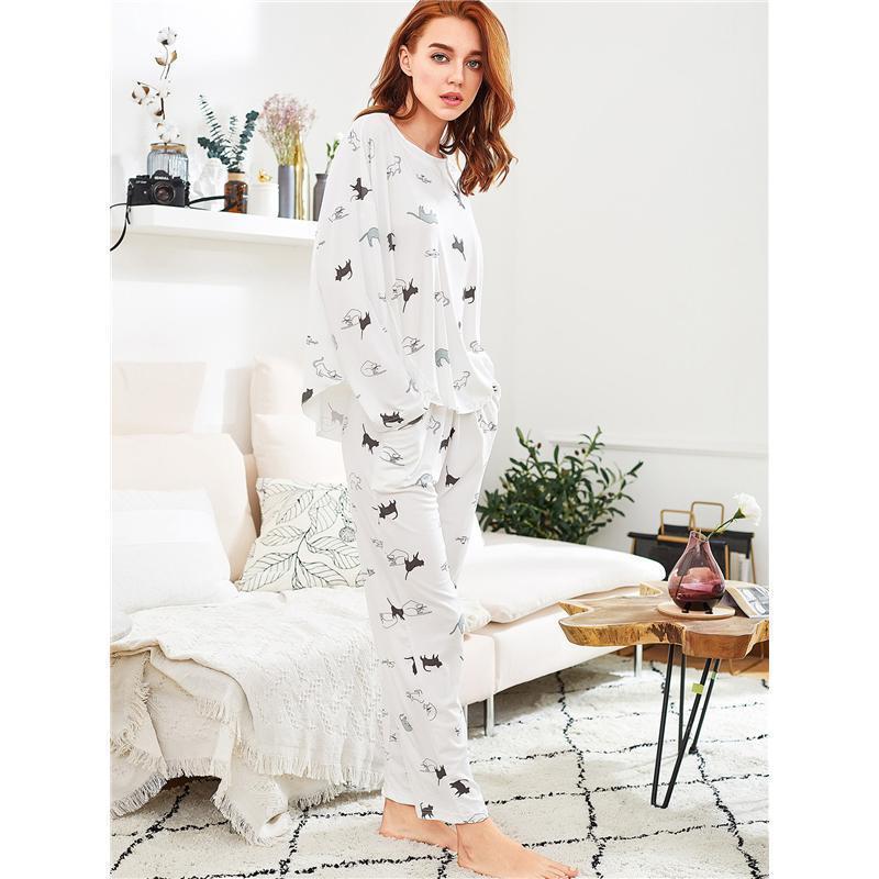 Soft and comfy womens cat pjs decorated with black and gray cats printed on a soft and stretchy fabric.