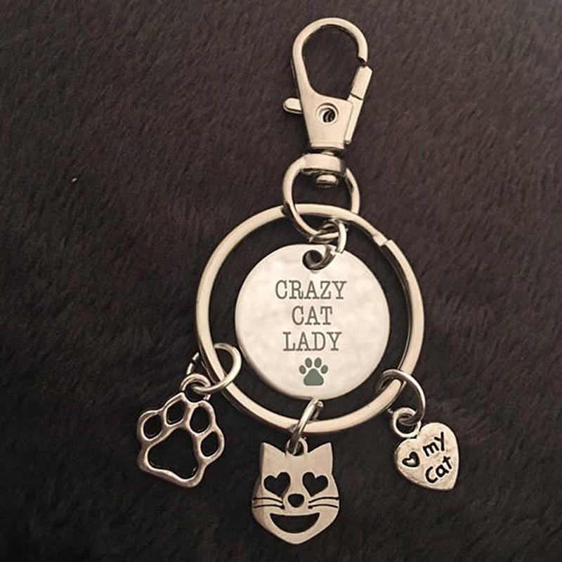 Kitty Cat Key Chain Featuring 3 Cat Charms and the Words Crazy Cat Lady Engraved on a Fourth Charm